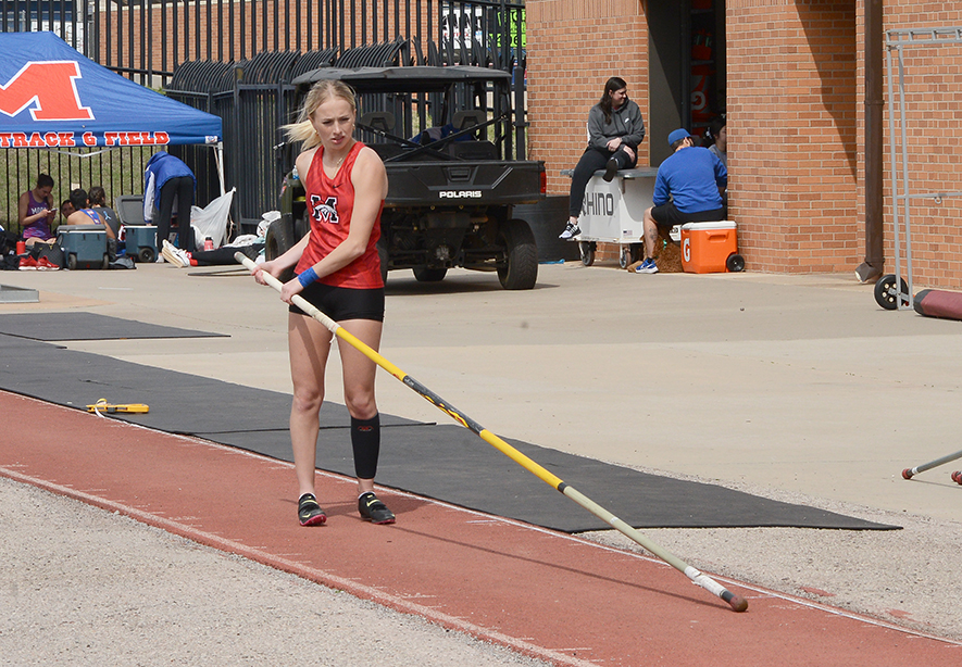 Cloutier sets state record in pole vault; Broncos win home event for third straight meet championship