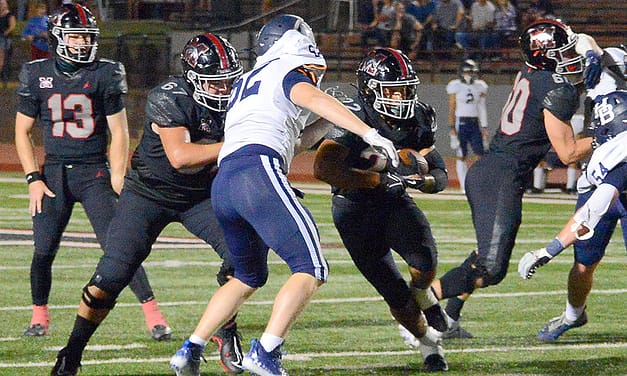 Dominant rushing attack fuels Mustang’s 41-13 win over Springdale Har-Ber